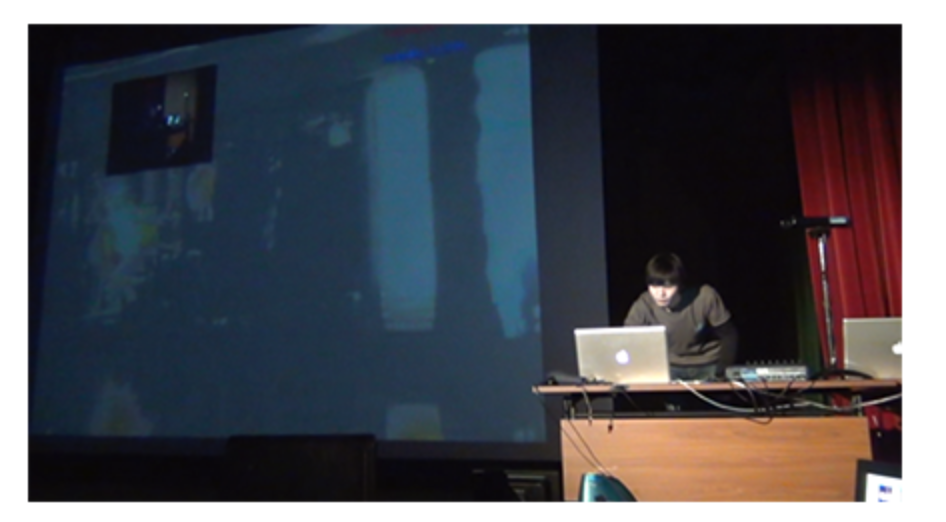 Liu Hao operating the real-time audiovisual system during a presentation of City - Beijing in 2011